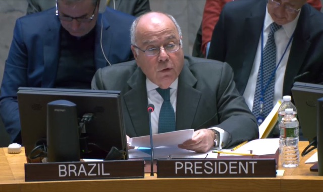 Mauro Vieira reading a statement at the UN Security Council table behind nameplates reading Brazil and President